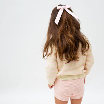 unisex cream and pink stripe knit sweater