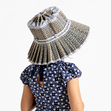 lorna murray x minnow slate floral and blue crosshatch children's capri hat